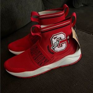 Champion shoes brand new the red size 9 and the brown size 6 black size 9